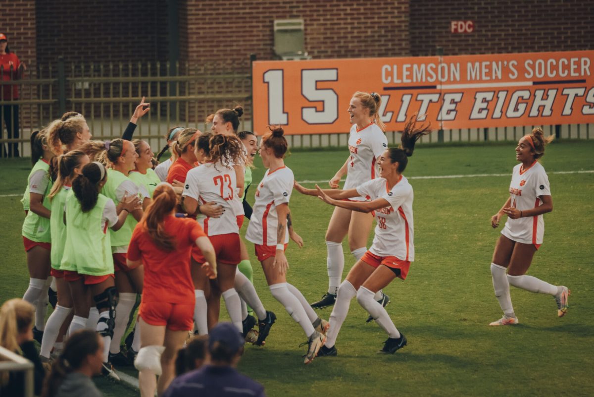 The Clemson women's soccer team celebrates against Florida State on Oct. 1, 2021.