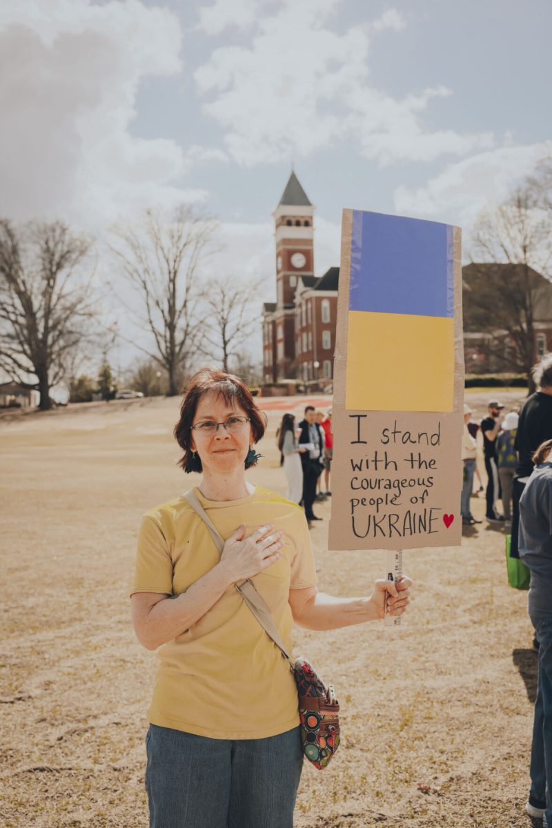 Supporters+wore+yellow+and+blue+and+carried+signs+to+show+their+support+for+Ukraine.