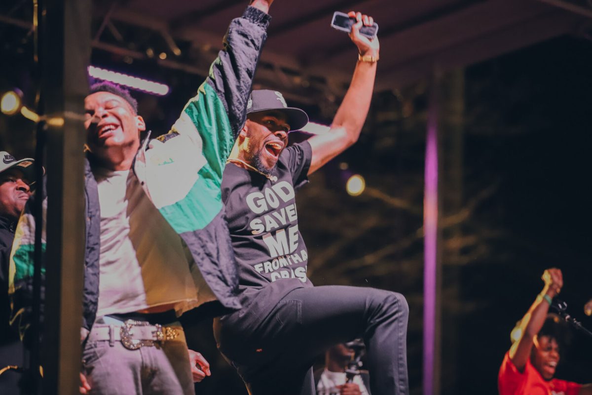 Seabash and friend Tmoney performing their song 'Pretty Faces' together while the crowd cheers them on.