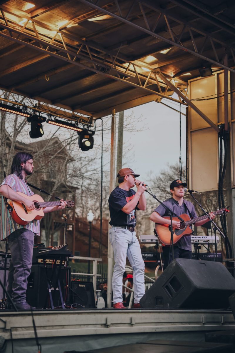 Current Clemson Student Hunter Holland performing hit country and pop songs while opening.