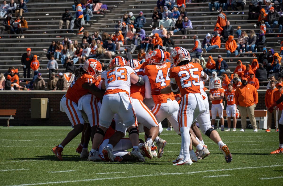 The+Orange+teams+defense+stuffs+the+line+of+scrimmage+during+Clemsons+spring+game+in+Memorial+Stadium+on+April+9%2C+2022.