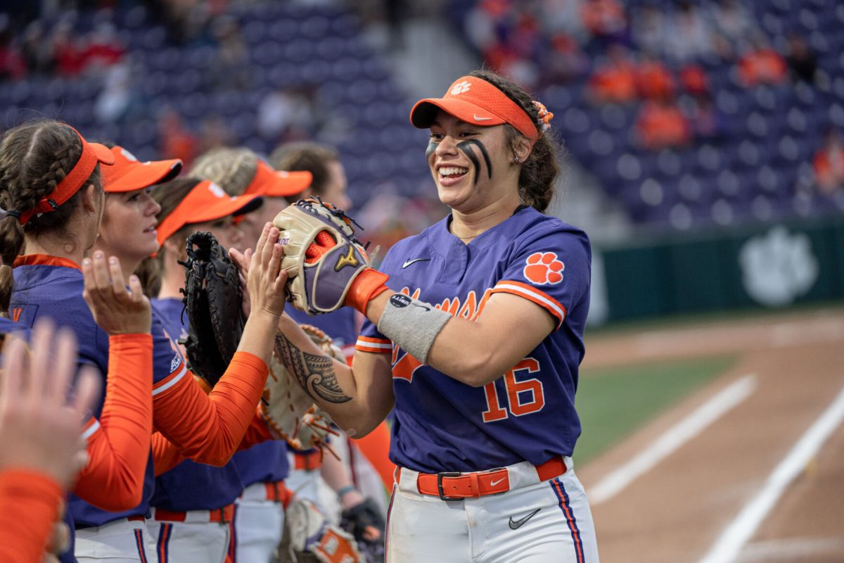 Clemson+shortstop+Alia+Logoleo+high+fives+teammates+during+the+Tigers+matchup+with+Boston+in+McWhorter+Stadium.%26%23160%3B
