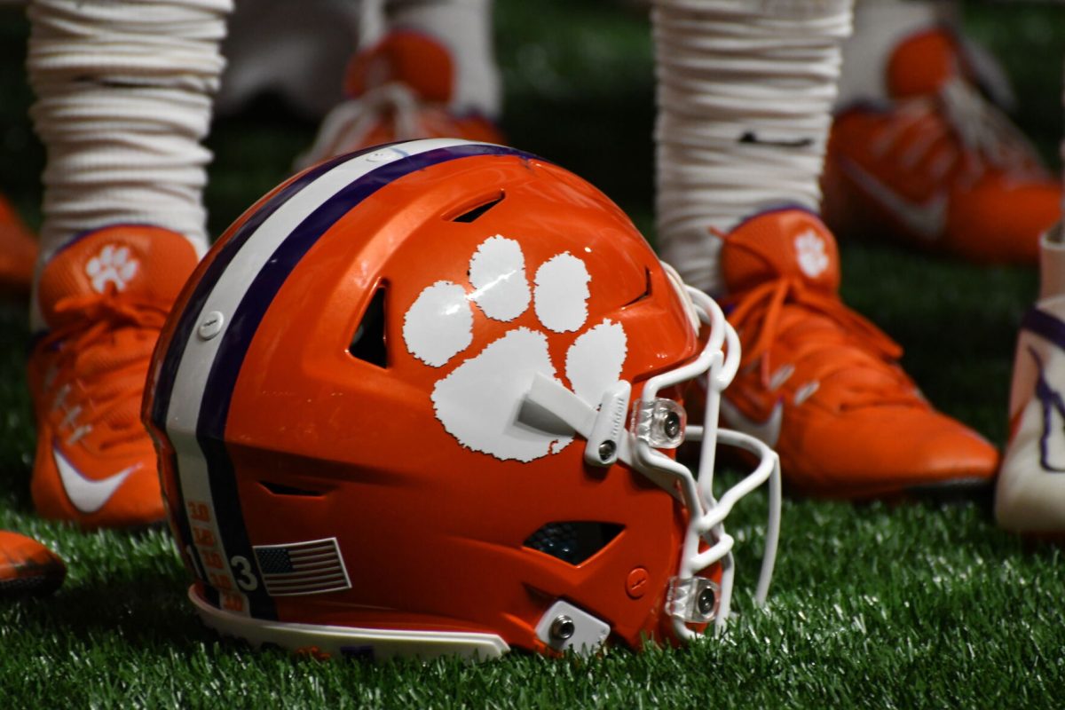 A Clemson helmet sits on the turf of Mercedes-Benz stadium, where the Tigers defeated Georgia Tech, 41-10, on Sept. 5, 2022. 