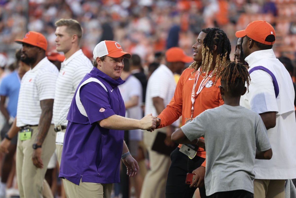 Clemson+defensive+coordinator+Wes+Goodwin+talks+with+recruits+ahead+of+the+Tigers+game+against+Louisiana+Tech+at+Memorial+Stadium+on+Sept.+17%2C+2022.