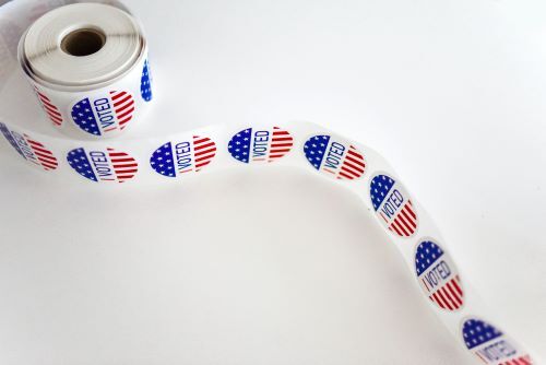 A roll of voting stickers. 