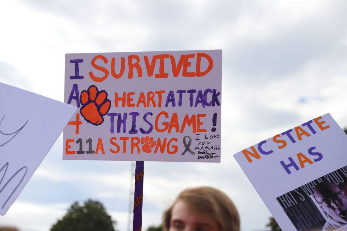 Clemson fans hold up a sign during College GameDays appearance at Clemson on Oct. 1, 2022.