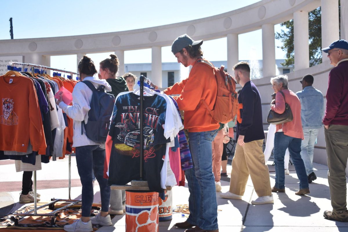 Students+swarmed+the+tables%2C+eagerly+sifting+through+vintage+clothing%2C+personalized+Clemson+apparel+and+handmade+accessories.