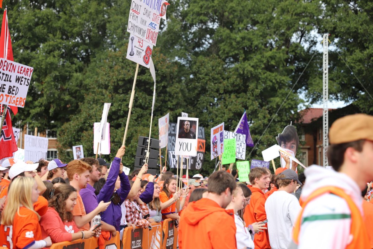 Clemson fans hold up signs during College GameDays visit to Clemson on Oct. 1, 2022. 