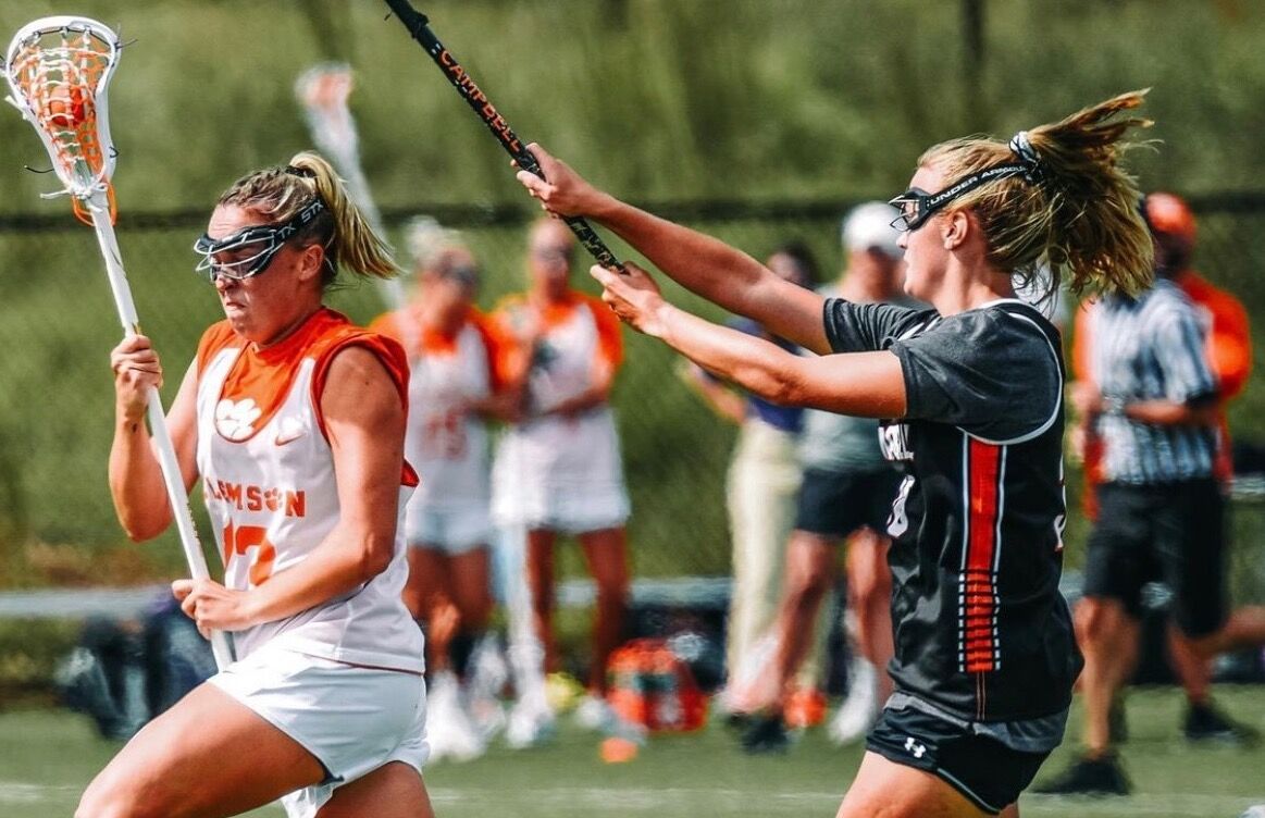 Clemson+midfielder+Marina+Miller+%2813%29+cradles+the+ball+during+an+exhibition+game+against+Campbell+on+Oct.+2%2C+2022.%26%23160%3B