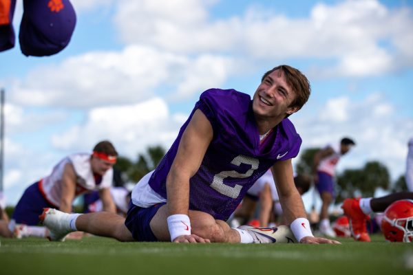 Cade Klubnik (#2) stretches during practice in Miami on Dec. 28, 2022 before the Orange Bowl.