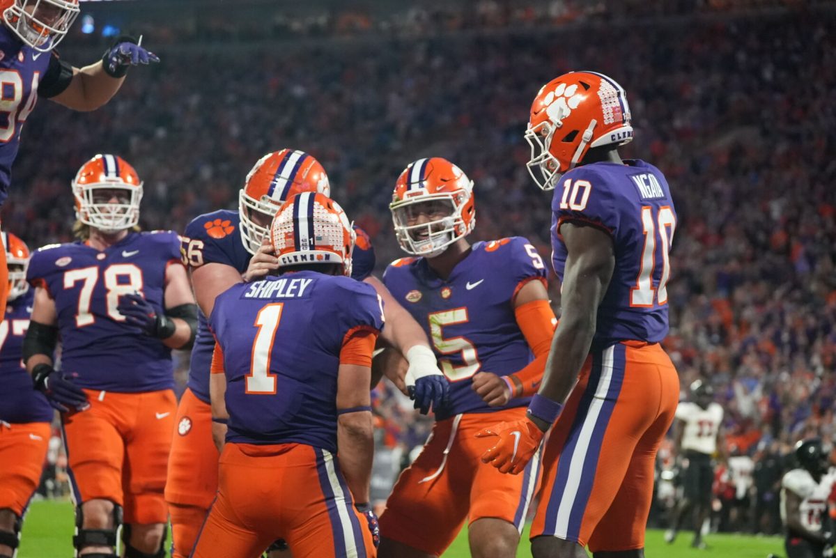 Clemson+quarterback+DJ+Uiagalelei+%285%29%2C+running+back+Will+Shipley+%281%29+and+wide+receiver+Joseph+Ngata+%2810%29+celebrate+during+the+Tigers+game+against+Louisville+in+Memorial+Stadium+on+Nov.+12%2C+2022.