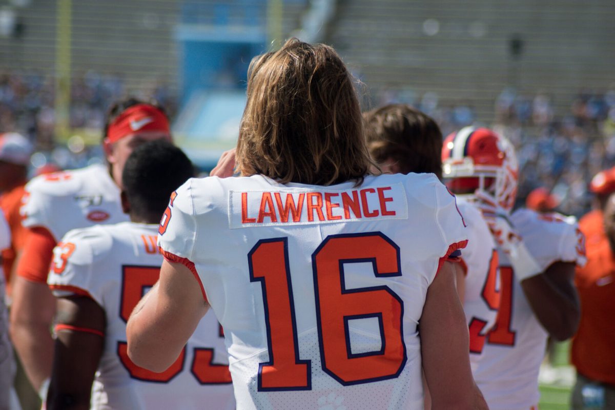 Trevor Lawrence steps onto the field prior to the Tigers game at North Carolina on Sept. 28, 2019