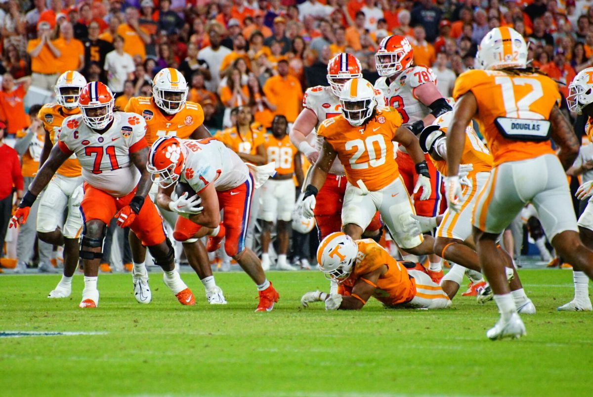 Clemson running back Will Shipley (1) evades Tennessee defenders during the 2022 Orange Bowl at Hard Rock Stadium on Dec. 30, 2022. 