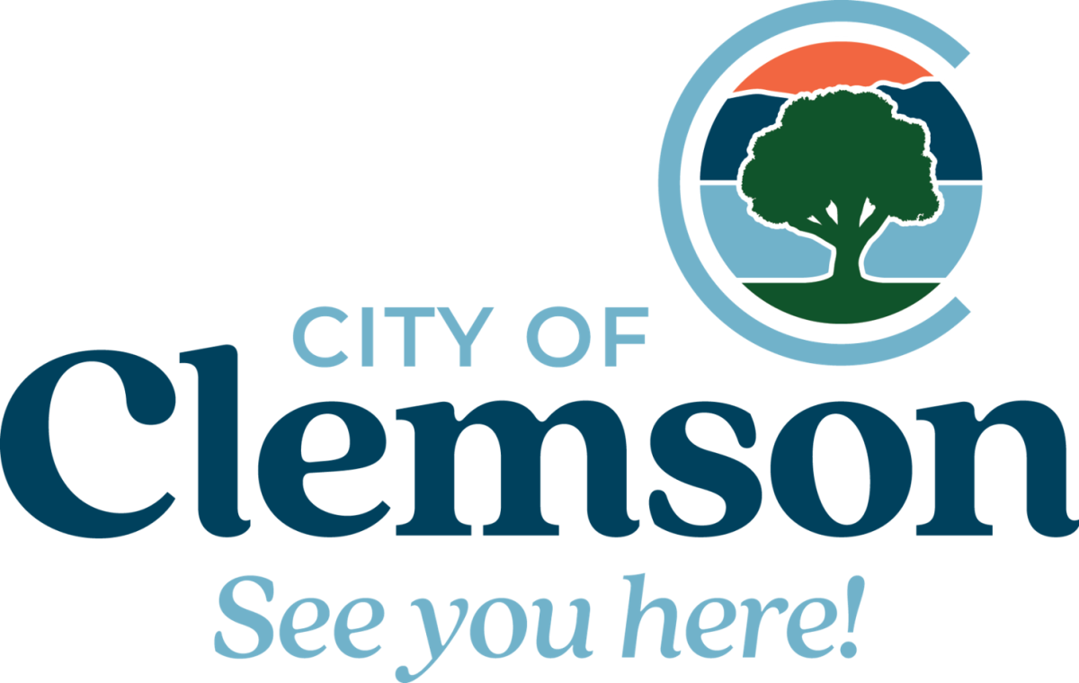 New logo and motto of the City of Clemson, as of January 2023. The logo features a tree made from elements of the Clemson Paw in front of a sunset over Lake Hartwell and the Blue Ridge.