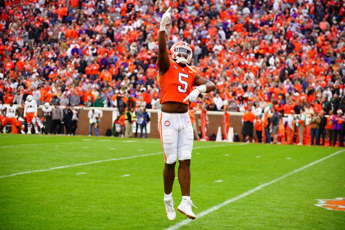 Clemson defensive end K.J. Henry celebrates during the Tigers game against Miami in Memorial Stadium on Nov. 19, 2022.