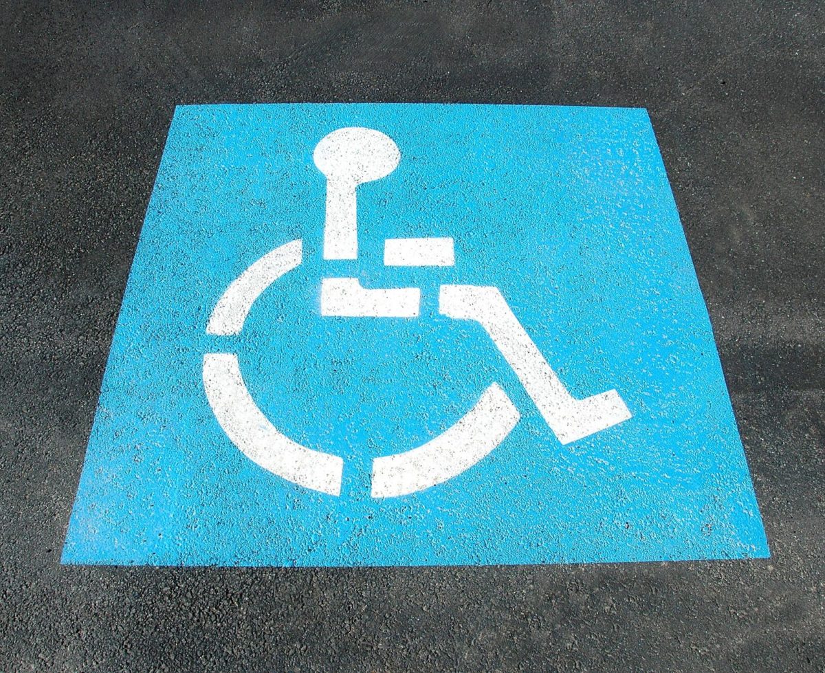 A handicap symbol on a street