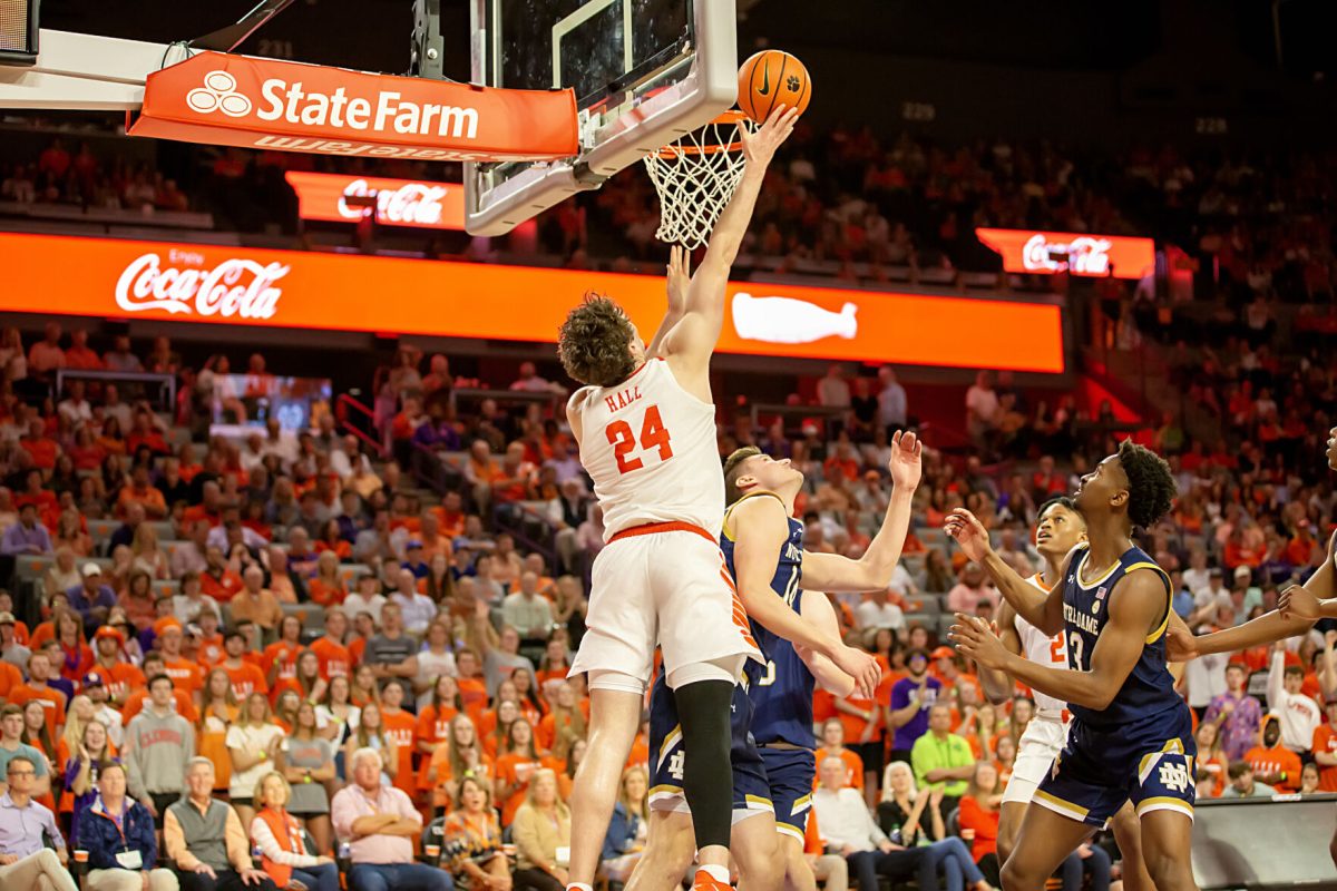 Clemson forward/center PJ Hall (24) goes up for a layup against Notre Dame in Littlejohn Coliseum on March 4, 2023. 