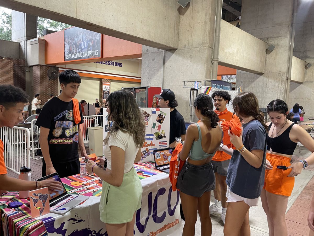 The executive board and Members of Latinos Unidos Clemson showcase their club at Tiger Prowl.