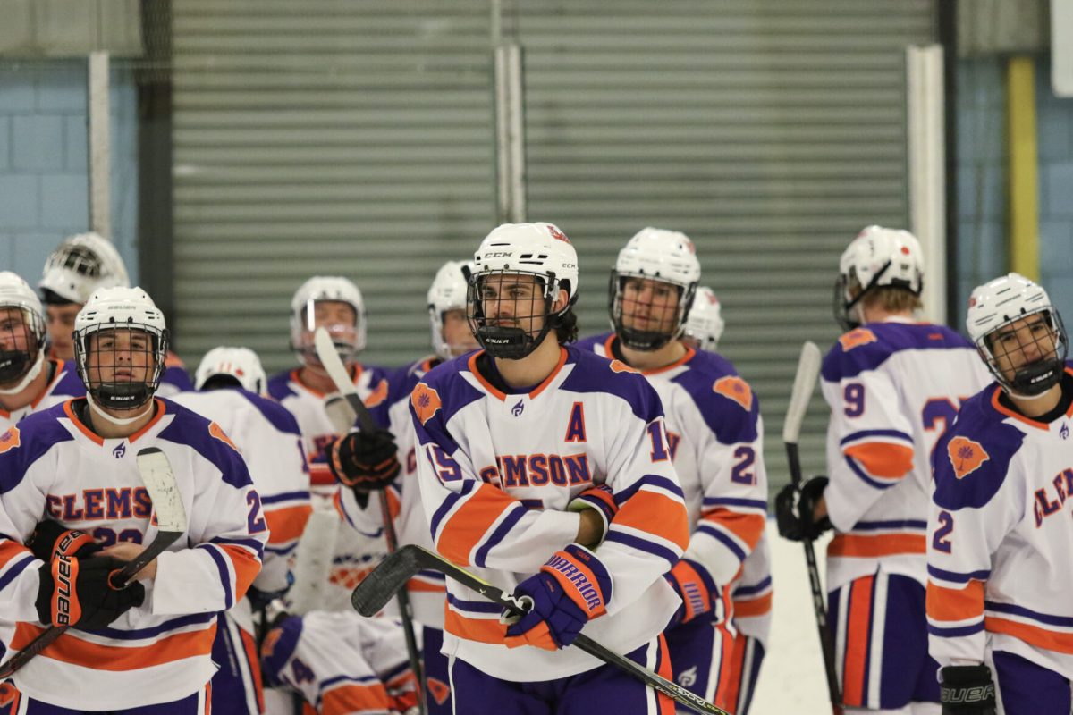 Assistant captain Ben Brucker leads the Tigers off the ice before Clemsons game against Middle Tennessee on Jan. 13, 2023. 