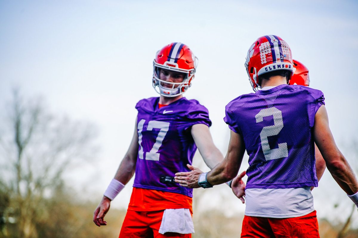 Freshman+quarterback+Christopher+Vizzina+%2817%29+has+earned+praise+at+practice+from+coaches+and+teammates+ahead+of+the+Tigers+2023+spring+game.+Pictured+with+starting+quarterback+Cade+Klubnik+%282%29+on+March+6%2C+2023.