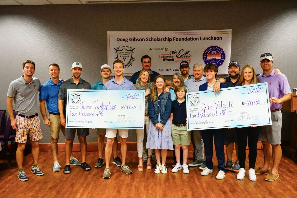 Jason Timberlake (left) of the Chi Phi Fraternity and Gino Vitelli (right) of Phi Mu Alpha Fraternity were each presented with $4,000 scholarships before the second annual Doug Gibson Memorial Golf Tournament.&#160;