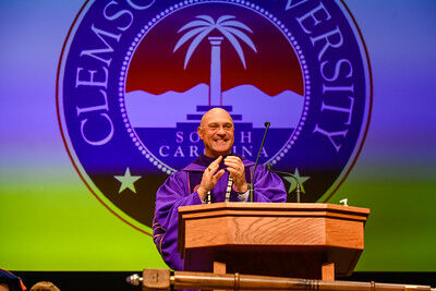 Clemson University President Jim Clements applauds the class of 2023 at the spring graduation ceremony. 