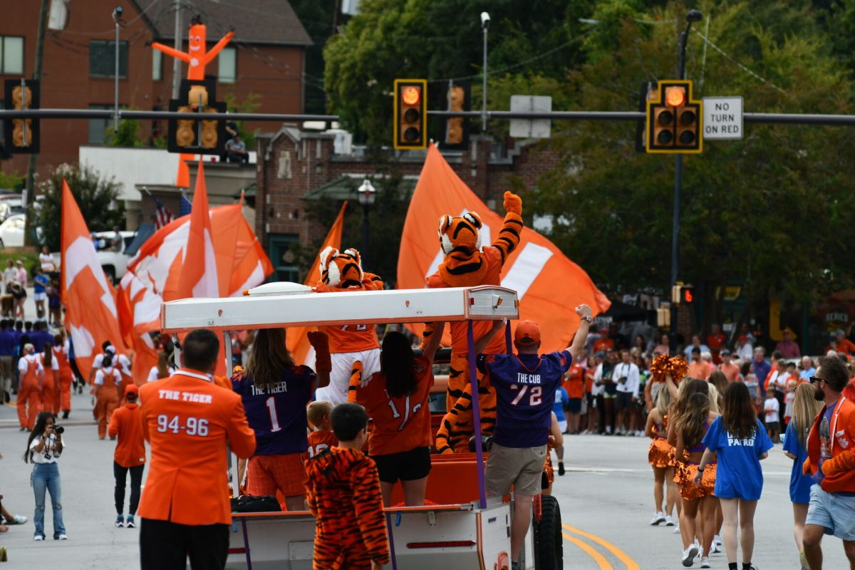 The+Tiger+cheering+on+Central+Spirit+as+they+wave+their+Clemson+flags+down+the+parade.