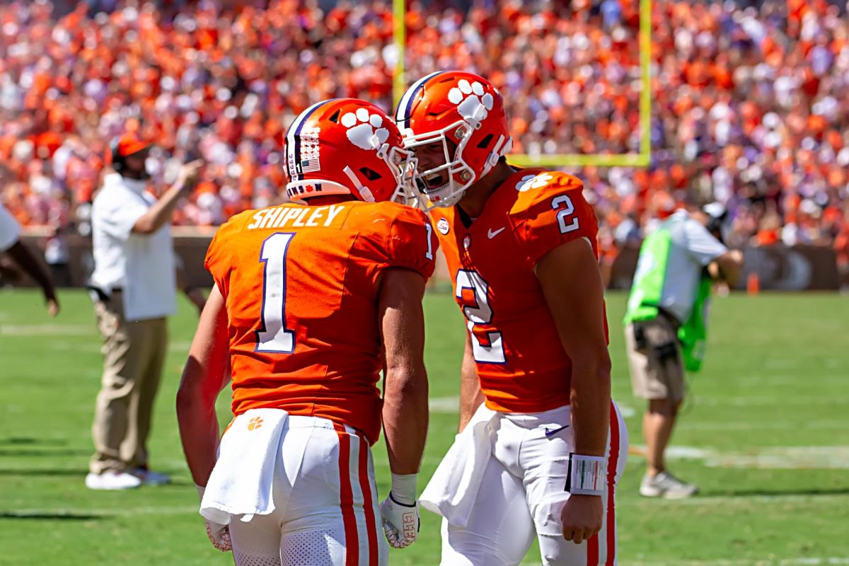 Clemson quarterback Cade Klubnik (2) celebrates with running back Will Shipley (1) after Shipley scored a touchdown against Florida State in Memorial Stadium on Sept. 23, 2023.