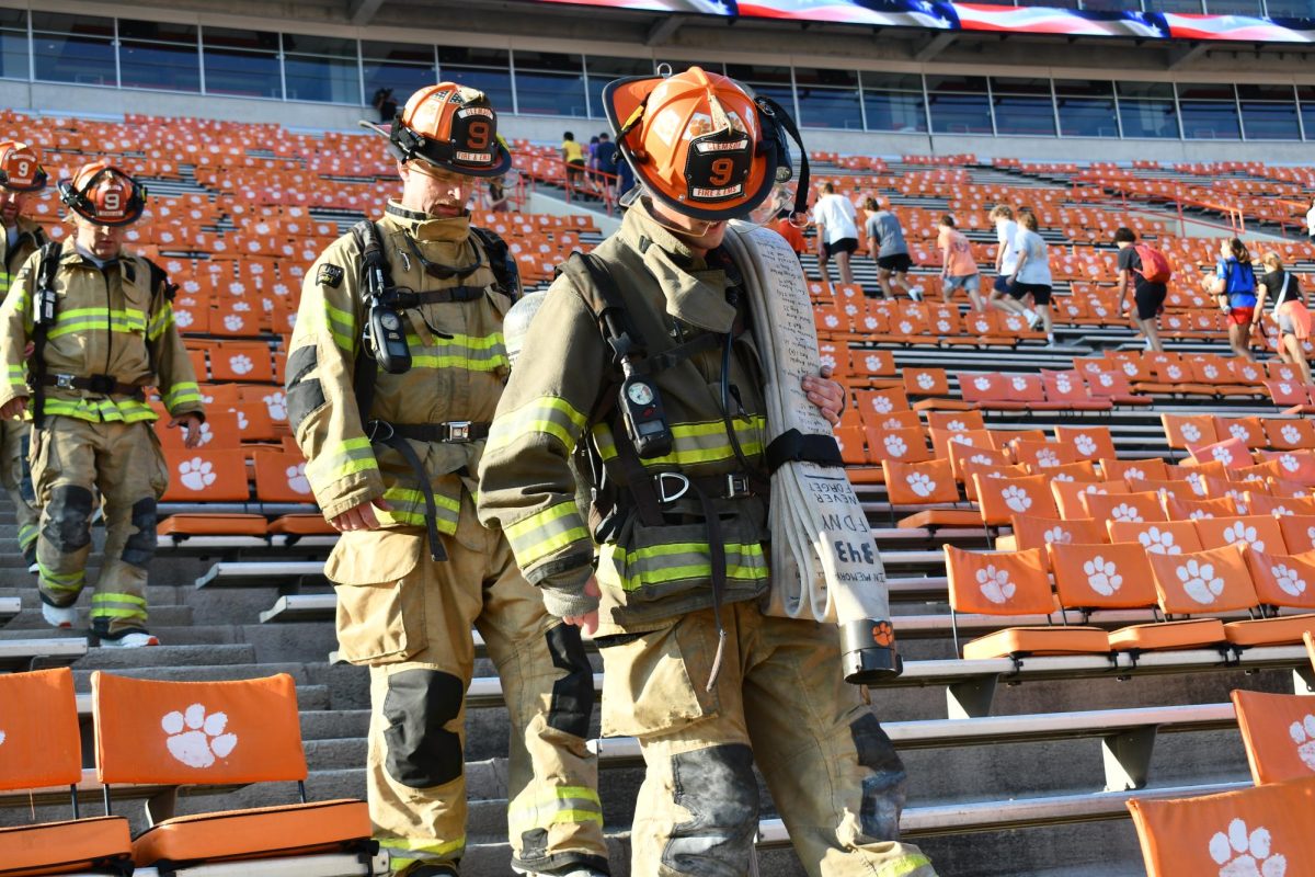Participants climb more than 100 flights of stairs at Clemson Universitys 2023 9/11 memorial stair climb event.
