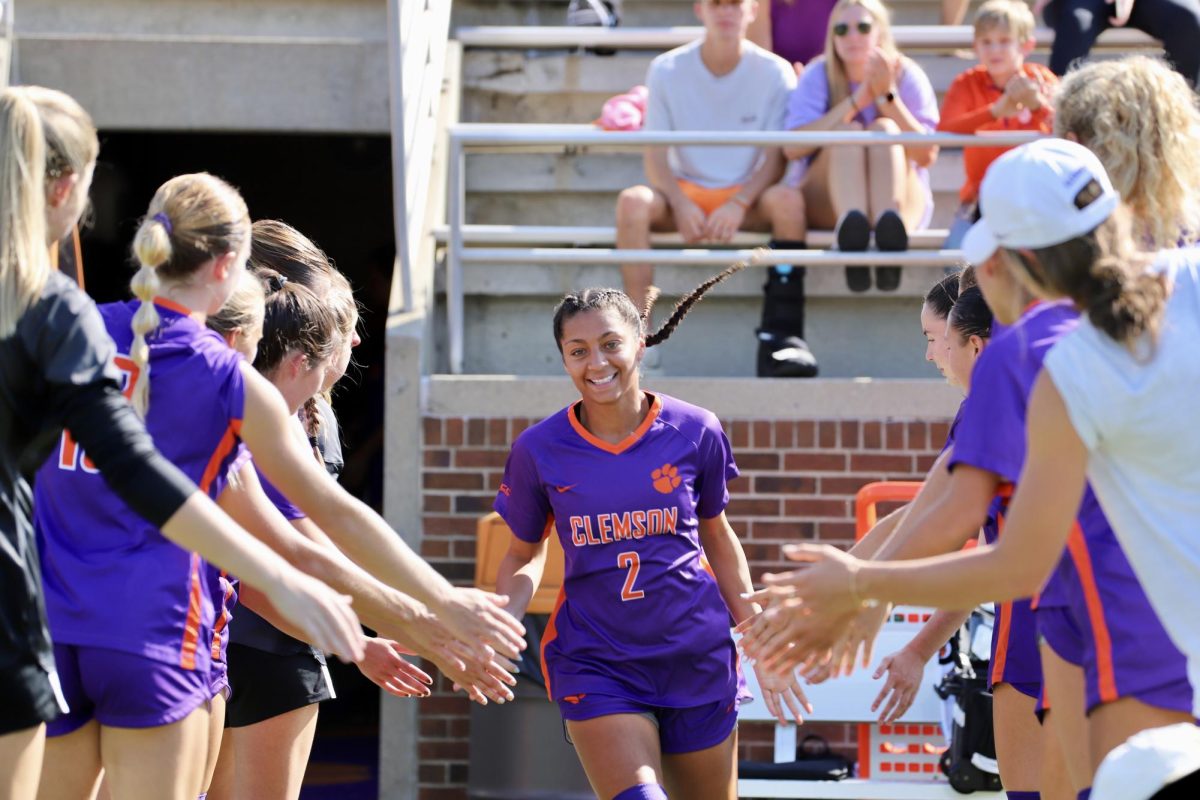 Senior+defender+Makenna+Morris+greets+her+teammates+before+hitting+the+pitch+against+Florida+State.+Morris%2C+although+not+prevalent+on+the+stat+sheet%2C+is+a+crucial+piece+of+keeping+the+Tigers+in+the+game.