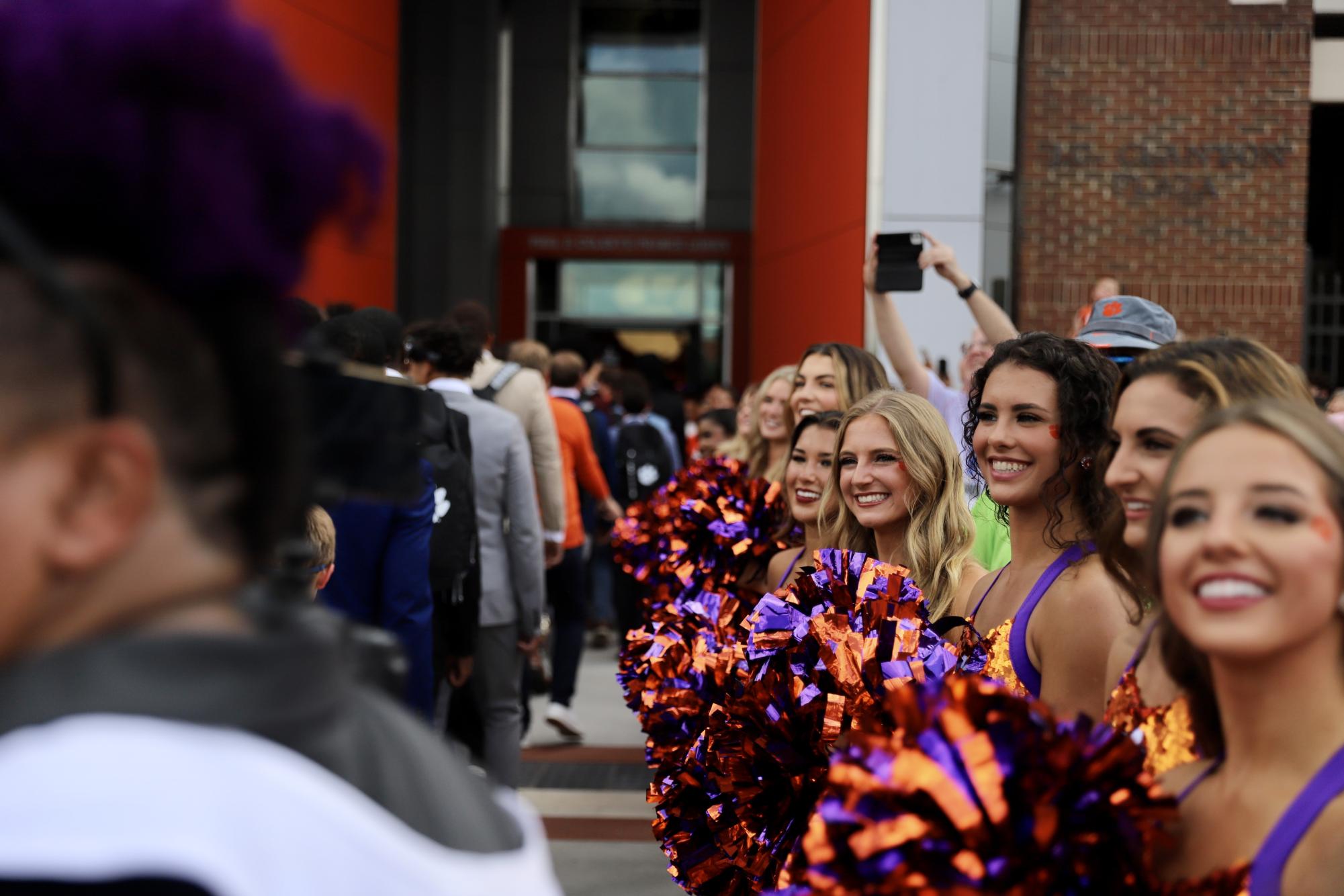 The Tigers enter Memorial Stadium before their home opener on their newly renovated Tiger Walk which features the names of every team captain in program history.