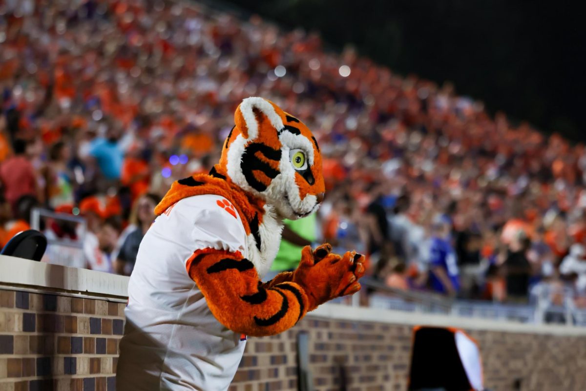 The Clemson Tiger cheers on the crowd to keep the energy up.