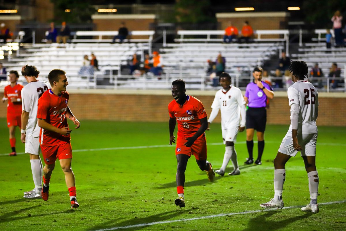 A perfect senior night: Ousmane Sylla cant contain his joy as he celebrates his first career hat trick in the Tigers 6-0 victory over Boston College on Oct. 20.