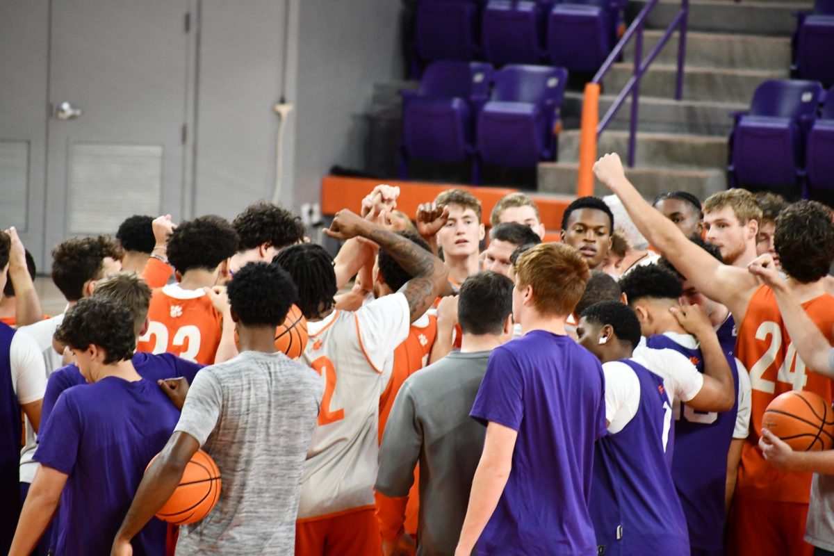 The Clemson mens basketball team gathers together before practice in Littlejohn Coliseum on Oct. 12, 2023.