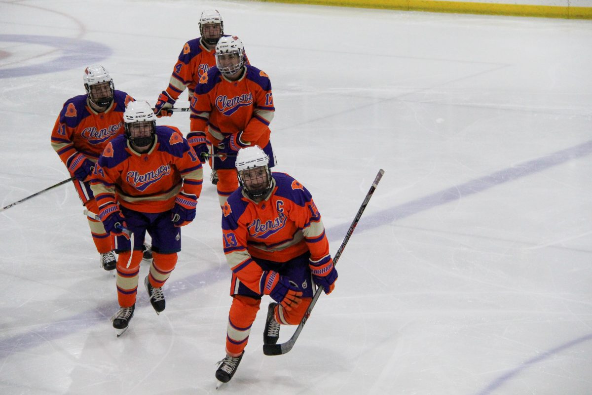 The Tigers skate towards their bench to celebrate a goal vs. Ole Miss on Friday, Oct. 13.