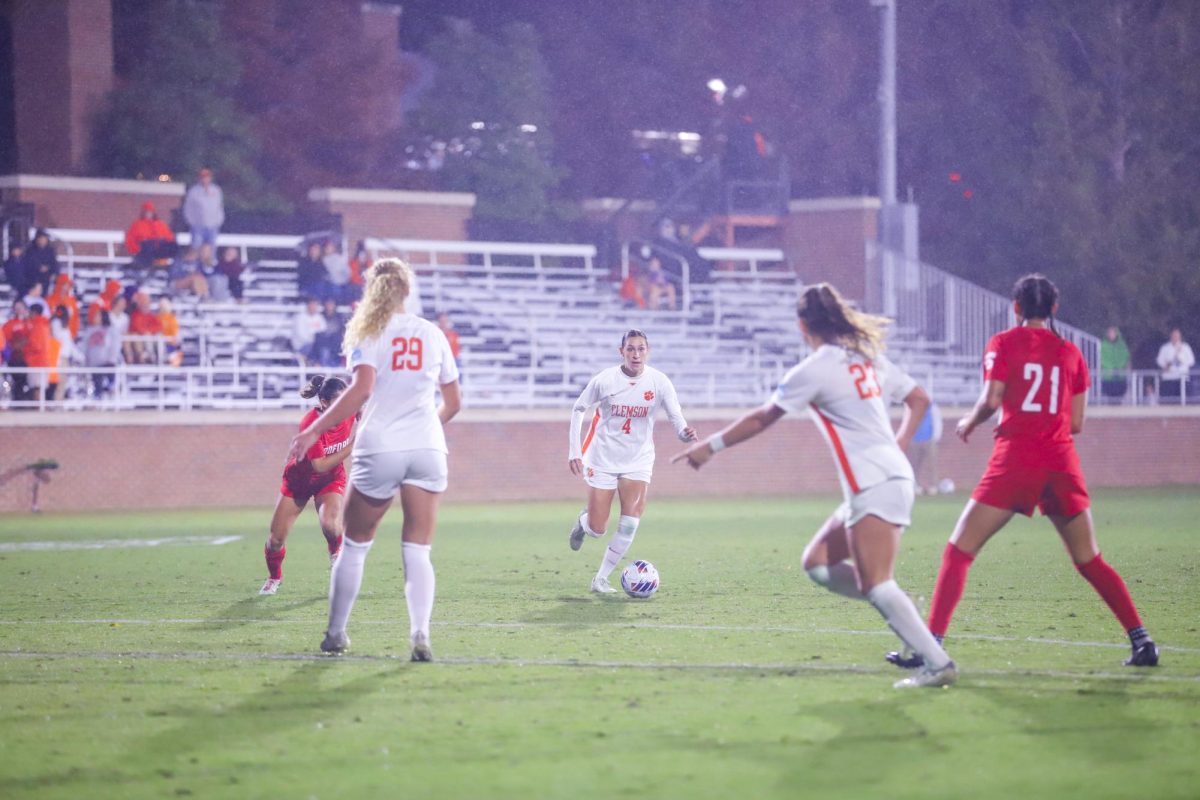 Defender Harper White looks to pass during the first round of the NCAA tournament at Historic Riggs Field on Friday, Nov. 10.