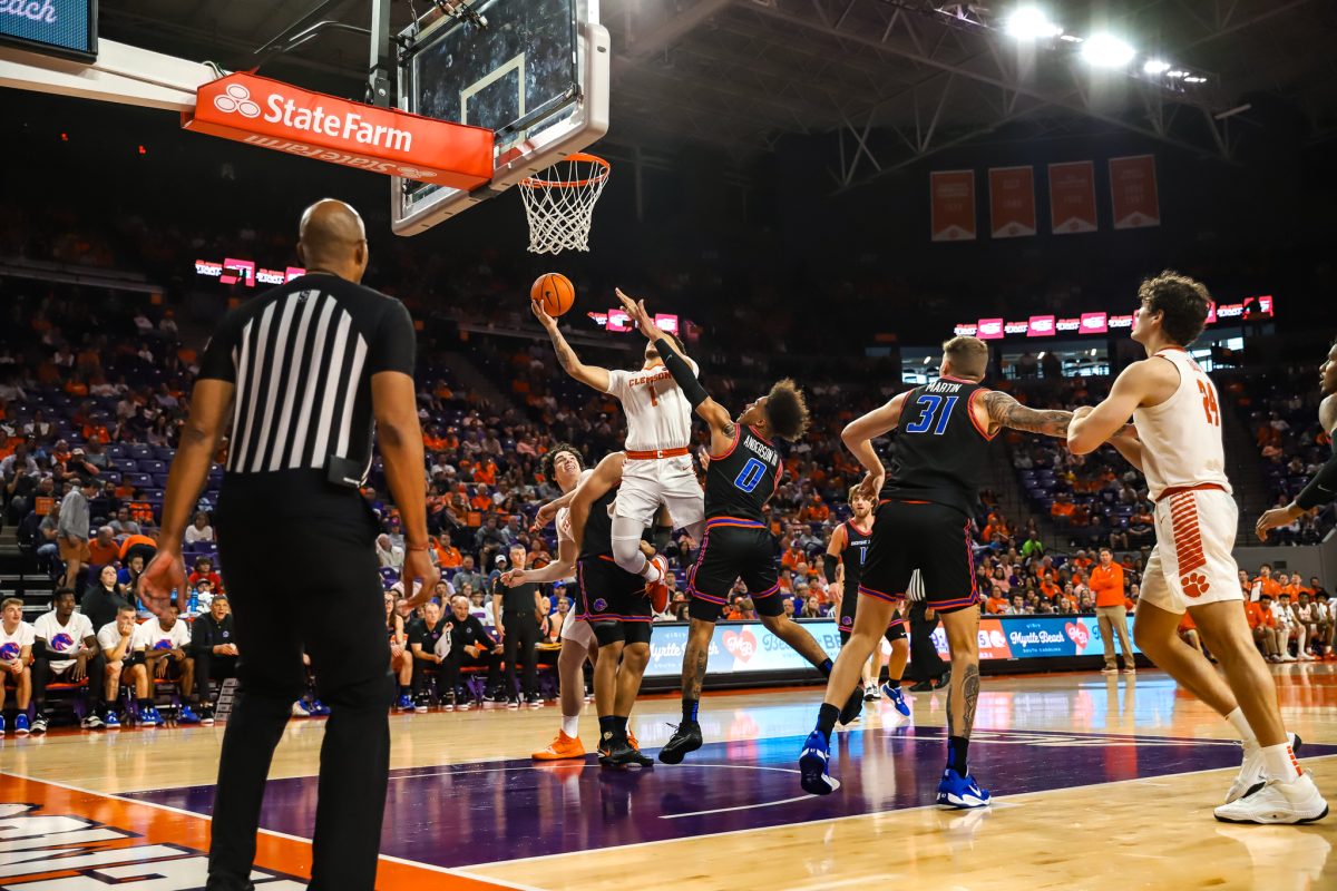Clemson+guard+Chase+Hunter+fights+to+sink+a+layup+against+Boise+State+on+Sunday.