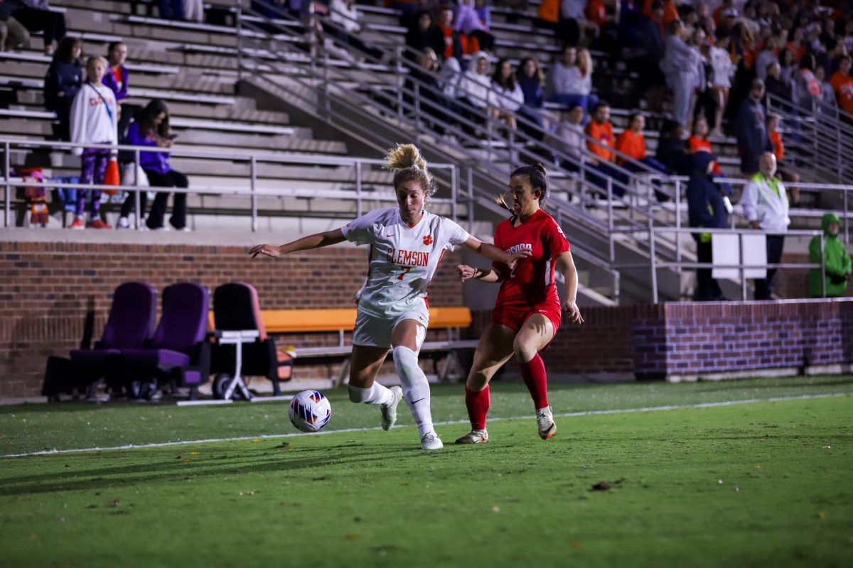 Midfielder Dani Davis dribbles past a defender during the first round of the NCAA tournament at Historic Riggs Field on Friday, Nov. 10.