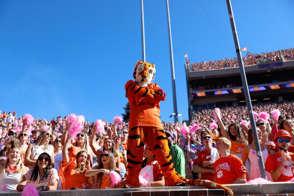 The Tiger mascot poses in front of the crowd in Memorial Stadium during the Clemson footballs game against Wake Forest on Oct. 7,  2023.