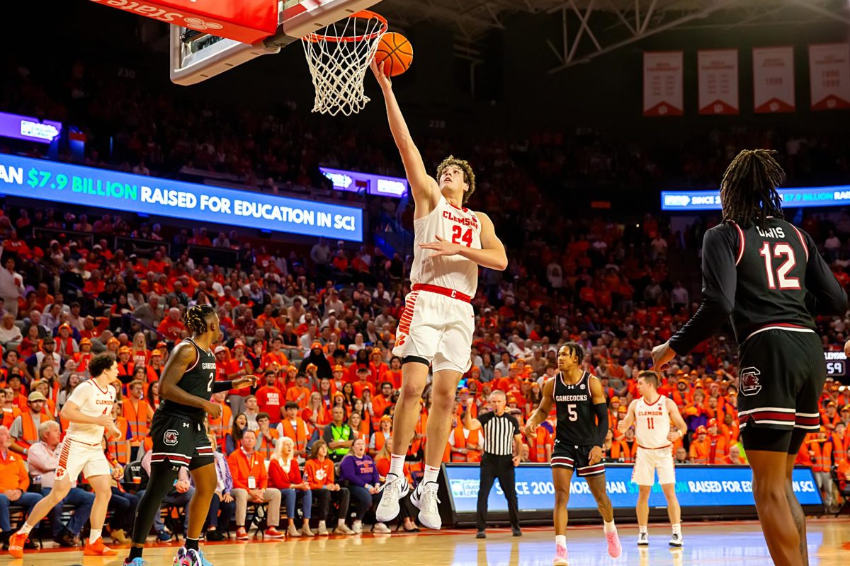 Clemson center PJ Hall shoots a layup during the game against South Carolina at Littlejohn Coliseum on Wednesday, Dec. 6, 2023.