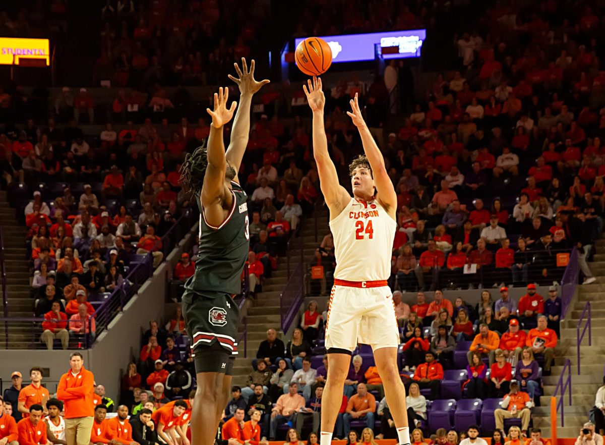 Clemson+center+PJ+Hall+shoots+a+shot+from+beyond+the+arc+during+the+Tigers+game+against+South+Carolina+in+Littlejohn+Coliseum+on+Dec.+6%2C+2023.