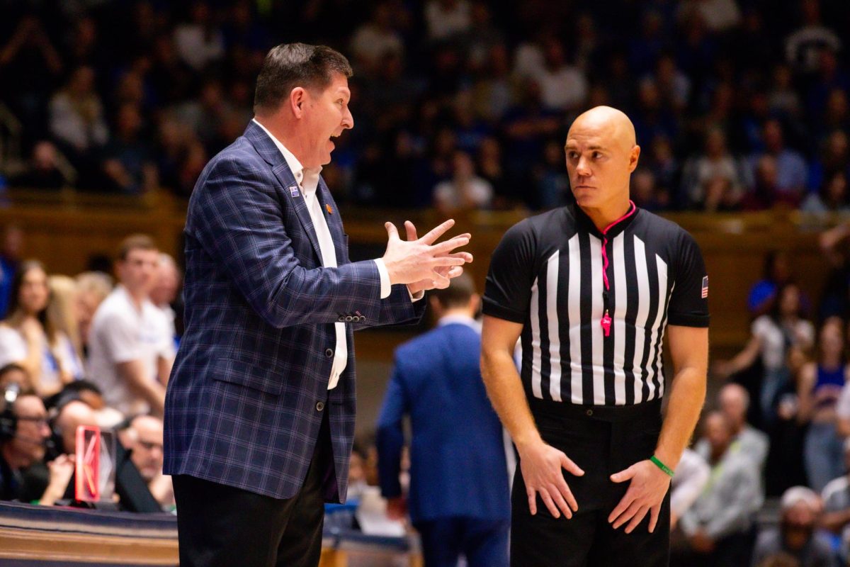 Clemson head coach Brad Brownell speaks to the referee during the game against Duke at Cameron Indoor Stadium on Saturday, Jan. 27, 2024.