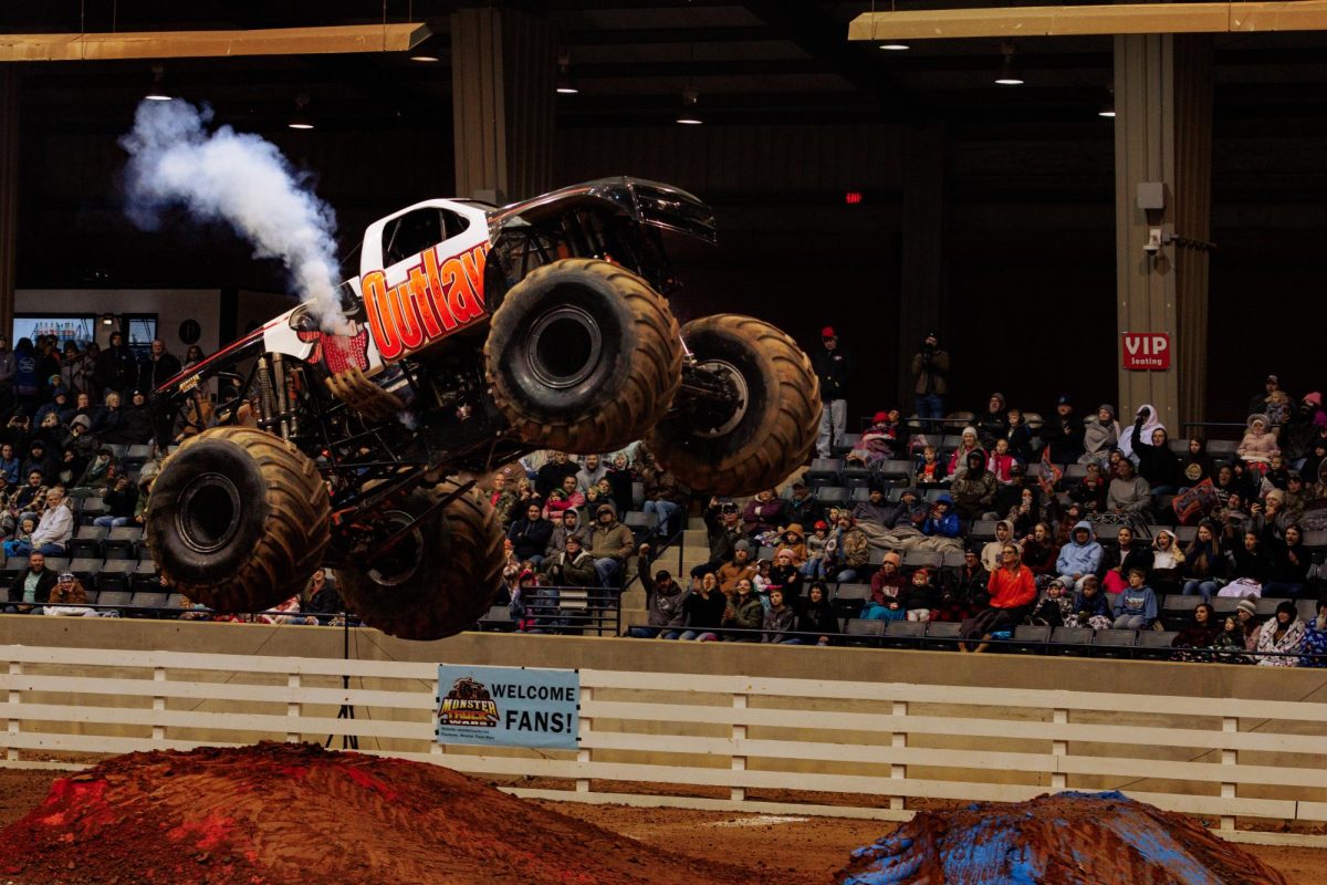Monster Truck Wars Outlaw does a jump at Garrison Arena on Jan. 20, 2024.
