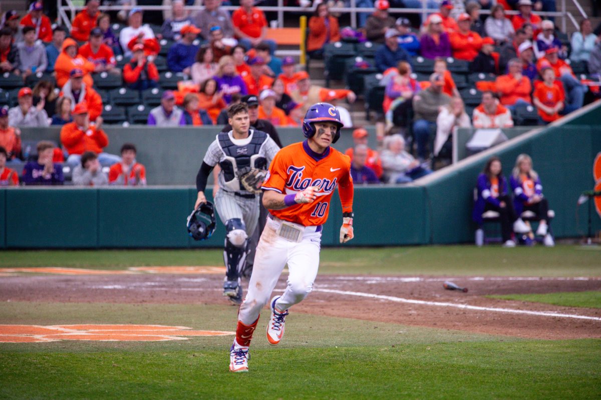 Clemson outfielder Cam Cannarella (10) runs to first base during Clemsons opening day win over Xavier on Feb. 16 at Doug Kingsmore Stadium. 