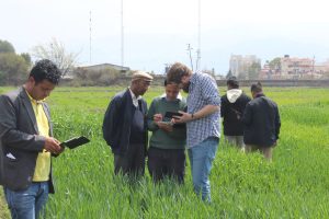 On a trip to Nepal, Clemson scientists helped Nepal farmers learn to use technology to record plant growth.