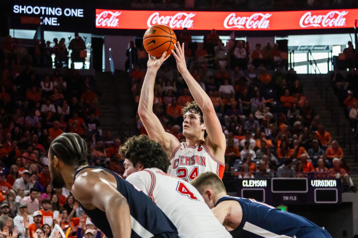 Clemson center PJ Hall brought the Tigers within one point against Virginia on Saturday thanks to his 3-for-3 free throw performance in the final minutes of the game.