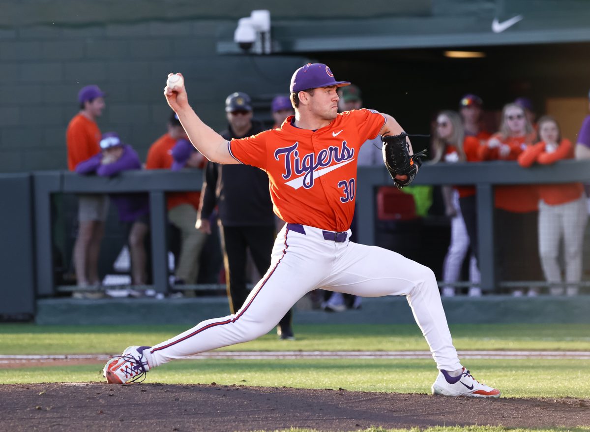 Clemson pitcher Billy Barlow (30) hurls a pitch on the mound in the Tigers loss to Kennesaw State on Friday afternoon at Doug Kingsmore Stadium.