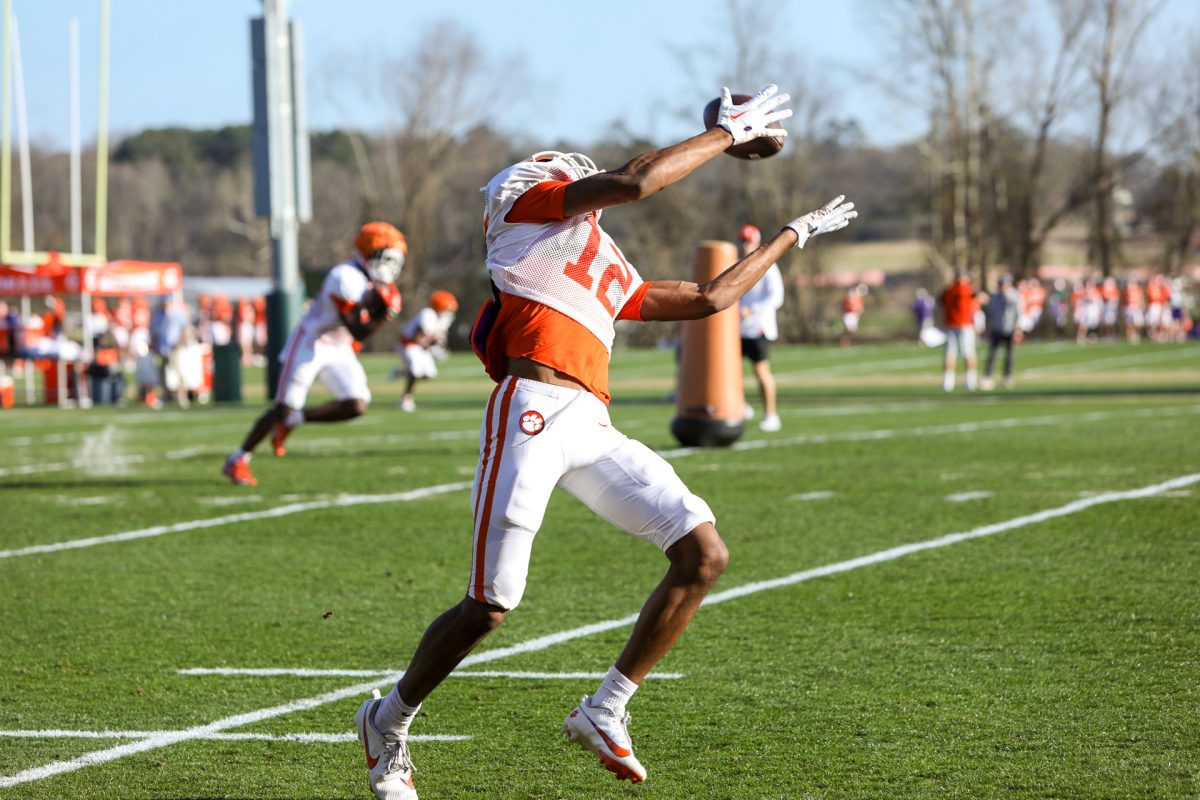 Clemson wide receiver Bryant Wesco Jr. makes a catch over his head during the Tigers practice on March 4, 2024.