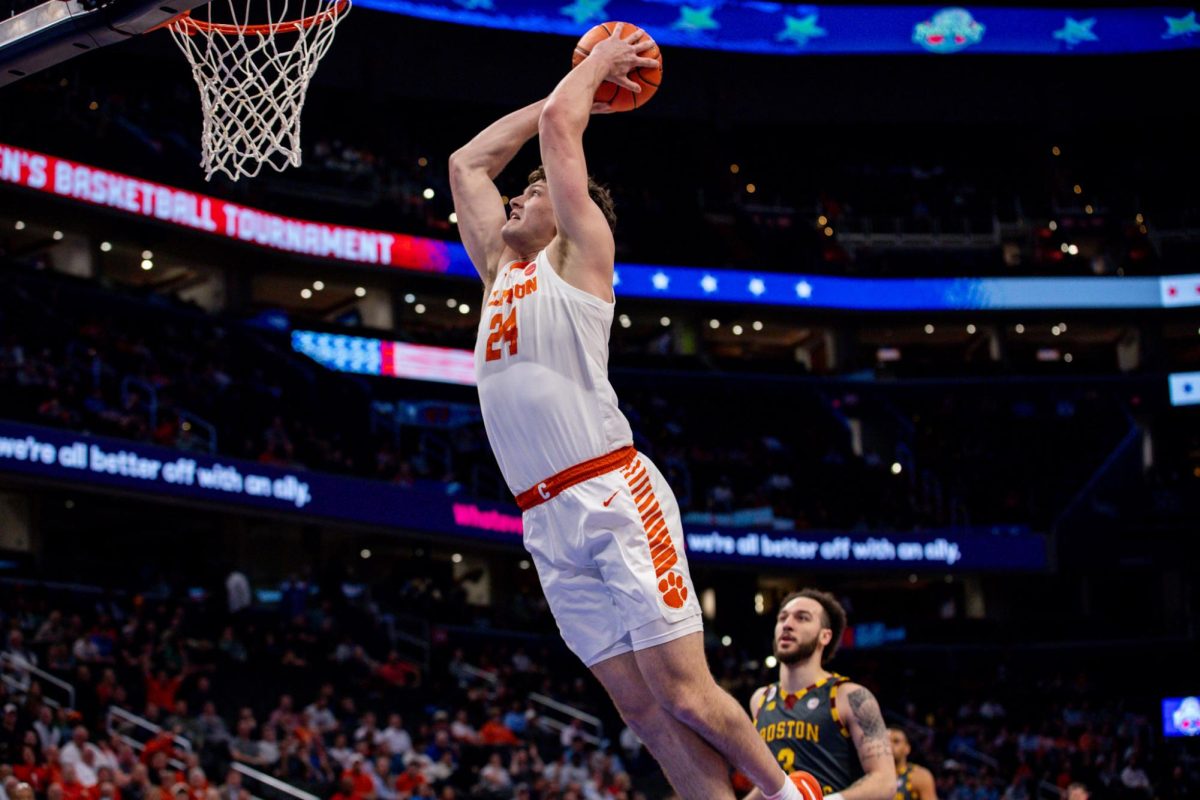 Clemson+center+PJ+Hall+slams+a+dunk+against+Boston+College+in+the+second+round+of+the+ACC+Tournament+in+Capital+One+Arena+on+March+13%2C+2024.