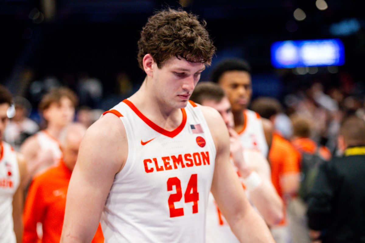 Center PJ Hall leaves the court after losing to Boston College in the second round of the ACC tournament at Capital One Arena on Wednesday, March 13, 2024.